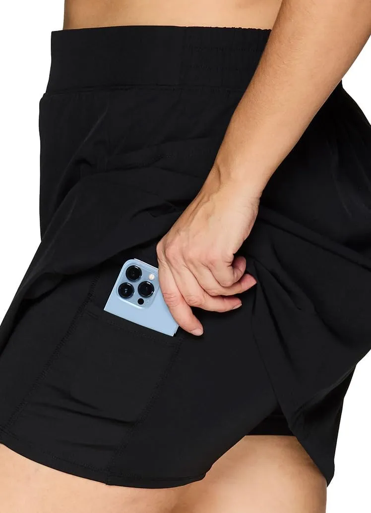 RBX Active Women's Plus Size Stretch Woven Athletic Skort with Attached Bike Short and Pockets